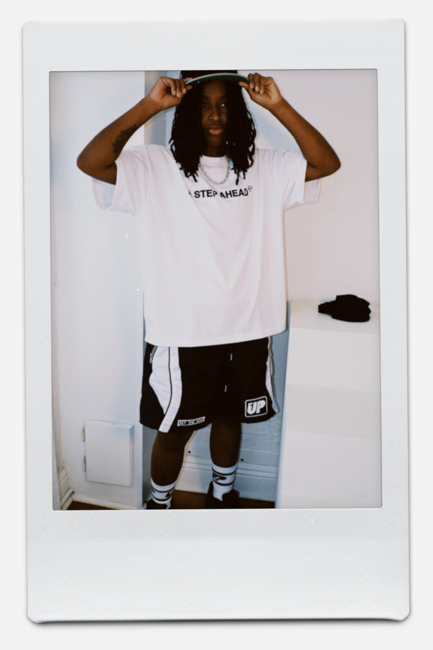 “A STEP AHEAD” TEE